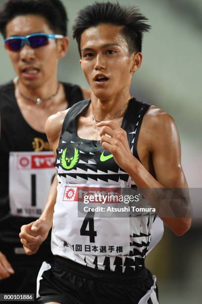 Suguru Osako of Japan competes in the Men 10000m final during the 101st Japan National Championships at Yanmar Stadium Nagai on June 23, 2017 in...