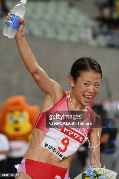 Mizuki Matsuda of Japan celebrates after winning in the Women 10000m final during the 101st Japan National Championships at Yanmar Stadium Nagai on...