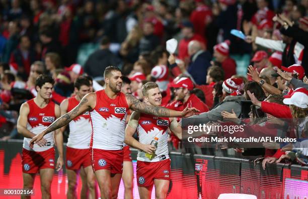 Lance Franklin of the Swans celebrates with fans after the round 14 AFL match between the Sydney Swans and the Essendon Bombers at Sydney Cricket...