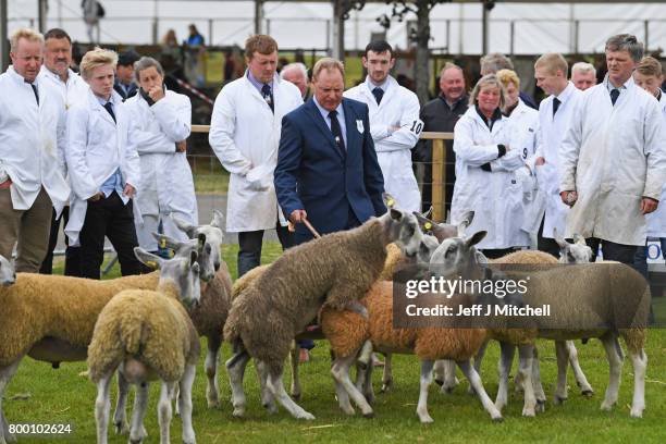 Farmers show their cattle at the Royal Highland show on June 23, 2017 in Edinburgh, Scotland.The Royal Highland Show is Scotland's annual farming and...