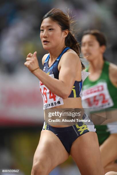 Nodoka Seko of Japan competes in the Women 100m semi final during the 101st Japan National Championships at Yanmar Stadium Nagai on June 23, 2017 in...