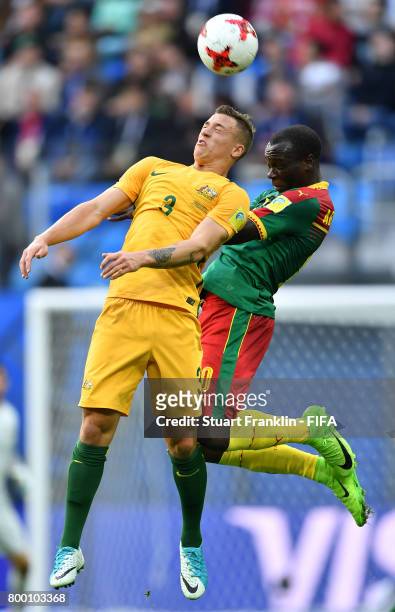 Alex Gersbach of Australia is challenged by Vincent Aboubakar of Cameroon during the FIFA Confederation Cup Group B match between Cameroon and...
