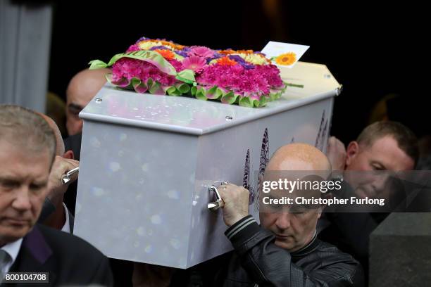 Pall bearers carry the coffin of Manchester attack victim Lisa Lees after her funeral service at St Anne's Church on June 23, 2017 in Oldham,...