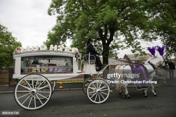 The funeral cortege of Manchester attack victim Lisa Lees leaves St Anne's Church on June 23, 2017 in Oldham, England. Lisa Lees was among 22 people...