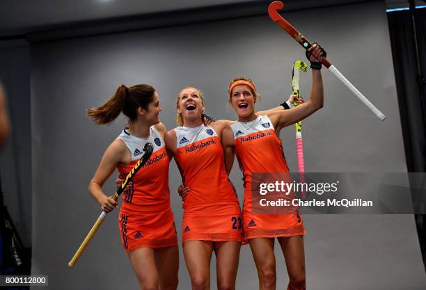 Netherlands players joke with one another during a player portrait photo session for FINTRO Hockey World League on June 23, 2017 in Brussels,...