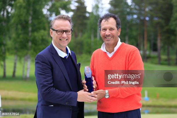 Santiago Luna of Spain poses with the trophy and Mika Walkamo, Chairman of the Board, Linna Golf after the final round of the European Tour...