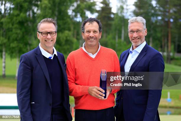 Santiago Luna of Spain poses with the trophy and Mika Walkamo, Chairman of the Board, Linna Golf and Petri Keskitalo, Managing Director Linna Golf...