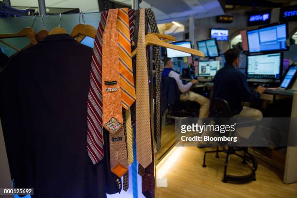 Ties hang on the floor of the New York Stock Exchange in New York, U.S., on Friday, June 23, 2017. U.S. Stocks edged higher, while Treasuries and the...