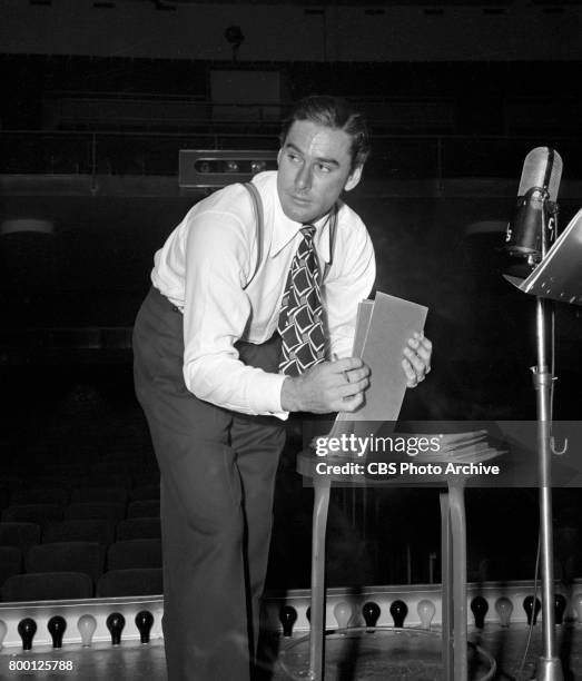 Radio program, Silver Theater, featuring actor Errol Flynn. They prepare for the presentation of "For Richer, For Richer." Hollywood, CA. Image dated...