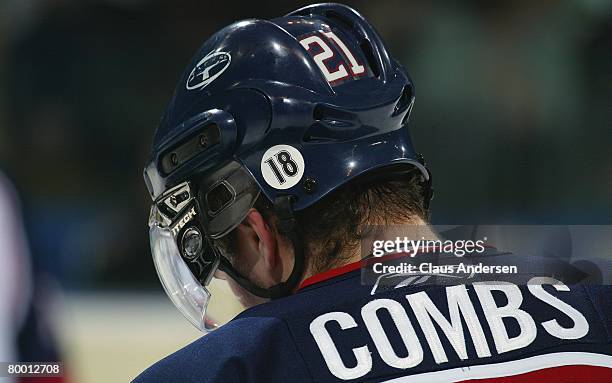 Jack Combs of the Saginaw Spirit displays a sticker on his helmet honouring the memory of Mickey Renaud of the Windsor Spitfires who past away the...