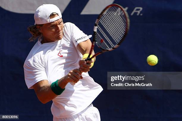 Peter Luczak of Australia plays a backhand against Sergio Roitman of Argentina during day two of the Abierto Mexicano Telcel Open February 26, 2008...