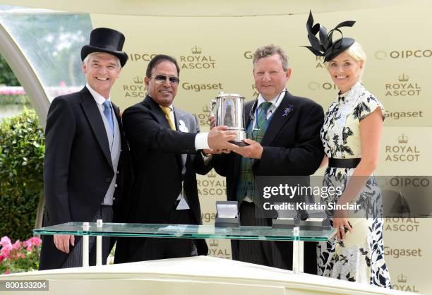 Phillip Schofield and Holly Willoughby present the King Edward VII Stakes to winners Abdulla Al Monsoon and Mark Johnston on day 4 of Royal Ascot at...