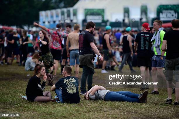 Festival goers take a rest during the Hurricane Festival 2017 on June 23, 2017 in Scheessel, Germany. The gates of the festival have officially...