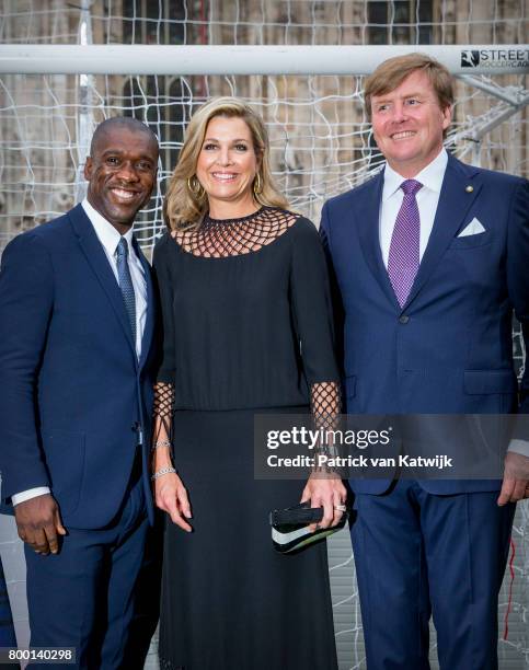 Clarence Seedorf, King Willem-Alexander of The Netherlands and Queen Maxima of The Netherlands attend a soccer clinic with dutch former players...