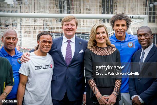 King Willem-Alexander of The Netherlands and Queen Maxima of The Netherlands attend a soccer clinic with dutch former players Clarence Seedor, Aaron...