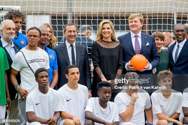 King Willem-Alexander of The Netherlands and Queen Maxima of The Netherlands attend a soccer clinic with dutch former players Clarence Seedor, Aaron...