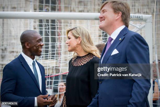 Clarence Seedorf, King Willem-Alexander of The Netherlands and Queen Maxima of The Netherlands attend a soccer clinic with dutch former players...