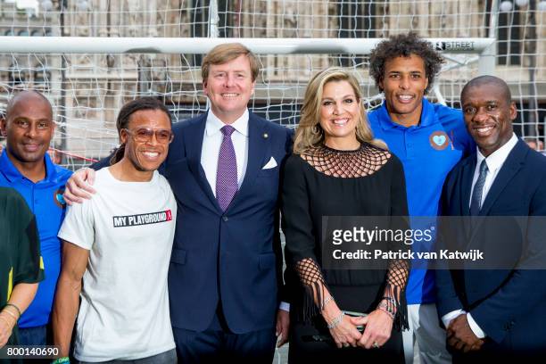 King Willem-Alexander of The Netherlands and Queen Maxima of The Netherlands attend a soccer clinic with dutch former players Clarence Seedor, Aaron...