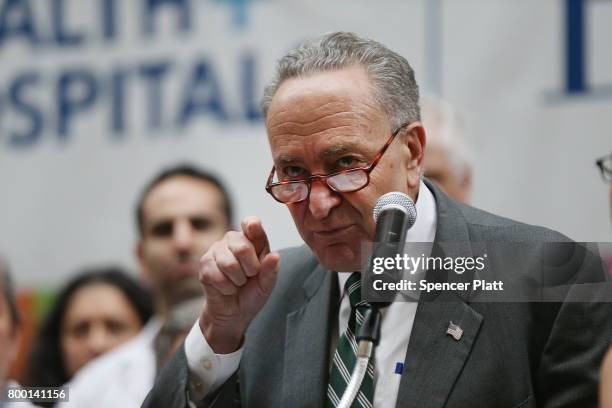 Senate Minority Leader Chuck Schumer speaks to doctors, nurses, patients and activists at Bellevue Hospital a day after the Republicans released...