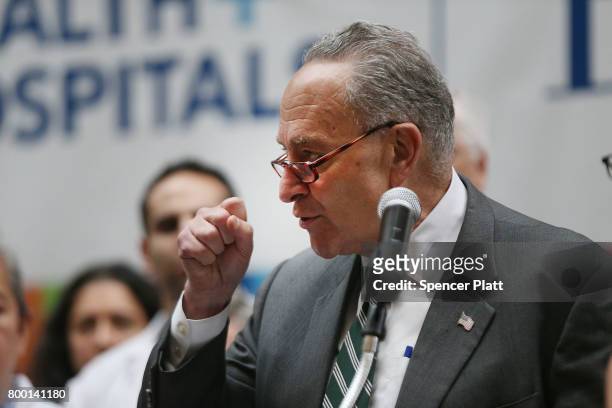 Senate Minority Leader Chuck Schumer speaks to doctors, nurses, patients and activists at Bellevue Hospital a day after the Republicans released...