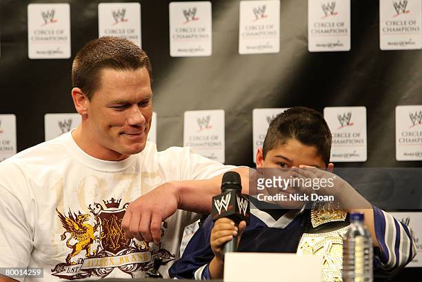 SuperStar John Cena and Make-A-Wish foundation special guest Max, speaks at the WWE and Make-A-Wish partnership announcement at U.S. Airways Center...
