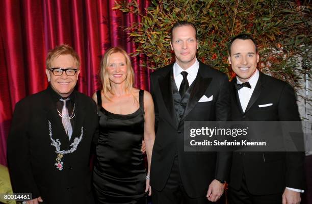 Elton John, Susan Duffy, Marc Hruschka, President and CEO of Chopard USA and David Furnish attend the 16th Annual Elton John AIDS Foundation Oscar...