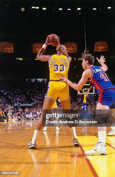 Kareem Abdul-Jabbar of the Los Angeles Lakers handles the ball during a game played circa 1989 at the Great Western Forum in Inglewood, California....