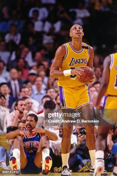 Kareem Abdul-Jabbar of the Los Angeles Lakers looks on during a game played circa 1989 at the Great Western Forum in Inglewood, California. NOTE TO...