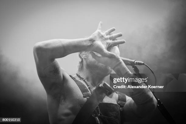 Australian-born singer and songwriter Xavier Rudd performs at the White Stage during the first day of the Hurricane festival on June 23, 2017 in...