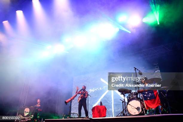 Australian-born singer and songwriter Xavier Rudd performs at the White Stage during the first day of the Hurricane festival on June 23, 2017 in...