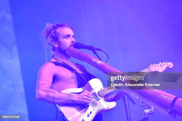 Australian-born singer and songwriter Xavier Rudd performs at the White Stage during the first day of the Hurricane festival on June 23, 2017 in...