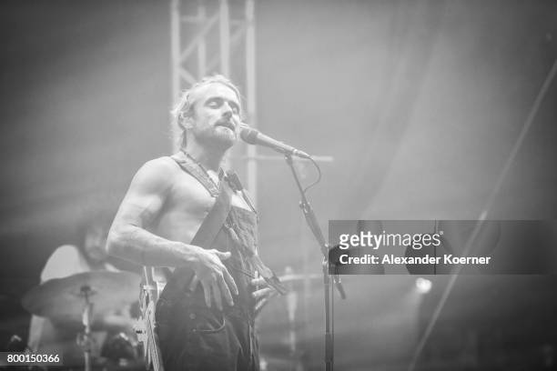 Australian-born singer and songwriter Xavier Rudd performs at the White Stage during the first day of the Hurricane festival on June 23, 2017 in...