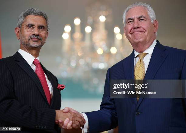 Secretary of State Rex Tillerson shakes hands with Indian Foreign Secretary Subrahmanyam Jaishankar prior to their meeting at the State Department...