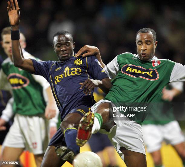 Roland Lamah from Roda JC vies with Juanito Sequeira from FC Dordrecht during their quarter final football match of the KNVB Dutch Cup at the GN Bouw...