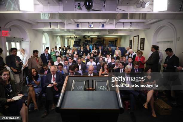 The television lights remain off as reporters wait for the arrival of White House Press Secretary Sean Spicer in the James Brady Press Briefing Room...