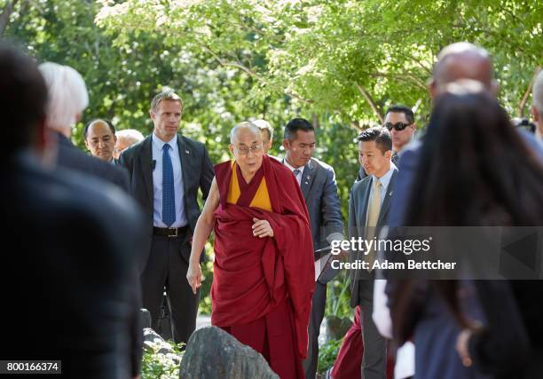 His Holiness the XIVth Dalai Lama greets Starkey founder Bill Austin, Tani Austin and Forest Whitaker at the Starkey Hearing Foundation Center For...