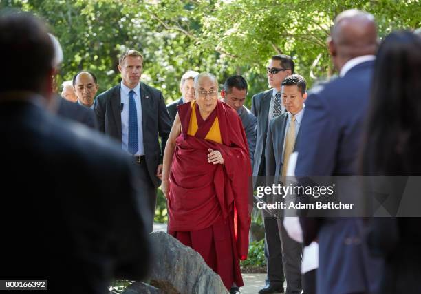 His Holiness the XIVth Dalai Lama greets Starkey founder Bill Austin, Tani Austin and Forest Whitaker at the Starkey Hearing Foundation Center For...