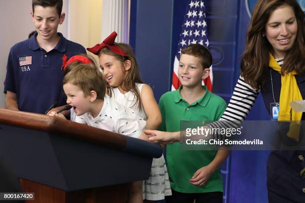 Joseph Frederick Kushner his sister 5-year-old Arabella Rose Kushner and friends play with the lecturn in the James Brady Press Briefing Room...