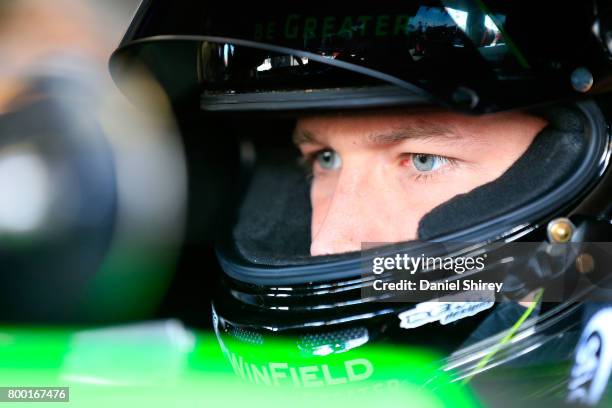 Dakoda Armstrong, driver of the WinField United Toyota, sits in his car during practice for the NASCAR XFINITY Series American Ethanol E15 250 at...