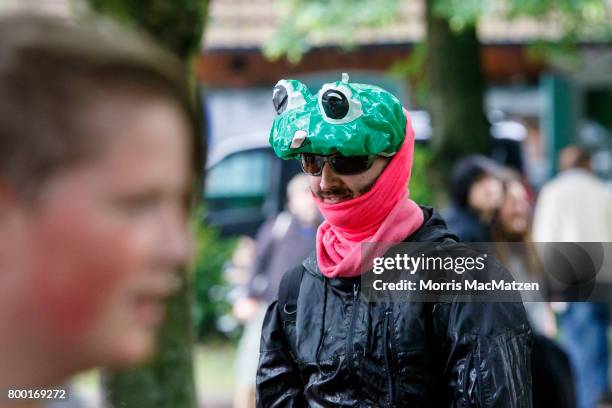 An activist is pictured during a protest against the upcoming G20 summit as they bombard each other with water balloons and squirt guns during a...