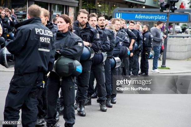 Policemen stand guard at an Al-Quds Demonstration in Berlin, Germany on June 23, 2016.