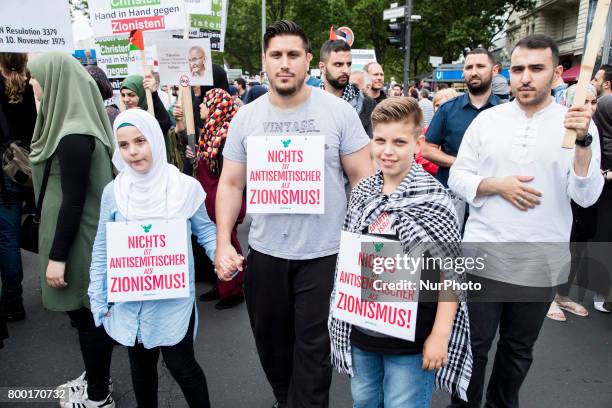 People attend an Al-Quds Demonstration in Berlin, Germany on June 23, 2016.