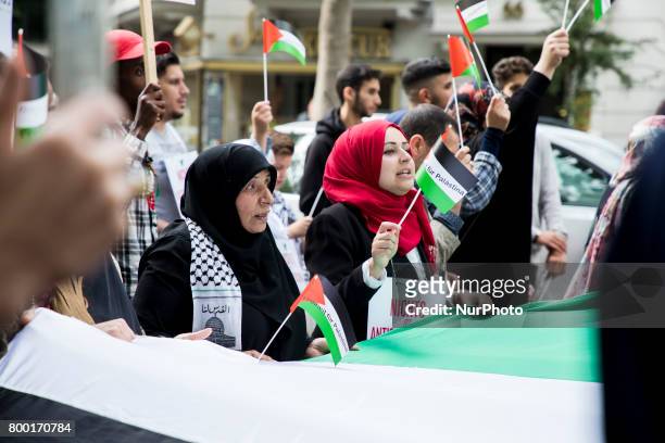 People attend an Al-Quds Demonstration in Berlin, Germany on June 23, 2016.