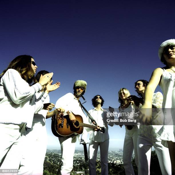 American psychodelic rock band Brian Jonestown Massacre tamborine man Joel Gion, guitarist/vocalist Anton Newcombe and Miranda Lee Richards pose with...