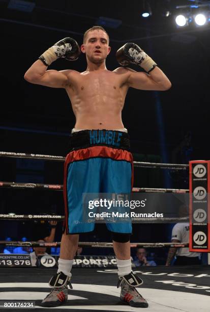 Jamie Humble celebrates after beating Alec Bazza during a Super-Featherweight contest presented by Matchroom Boxing at Walker Activity Dome on June...