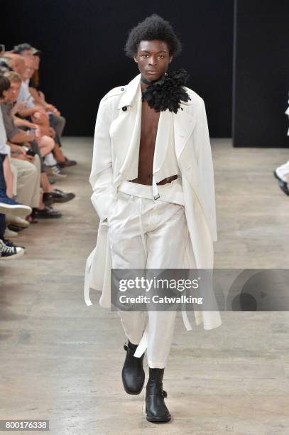 Model walks the runway at the Ann Demeulemeester Spring Summer 2018 fashion show during Paris Menswear Fashion Week on June 23, 2017 in Paris, France.