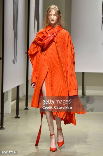 Model walks the runway at the Juun.J Spring Summer 2018 fashion show during Paris Menswear Fashion Week on June 23, 2017 in Paris, France.