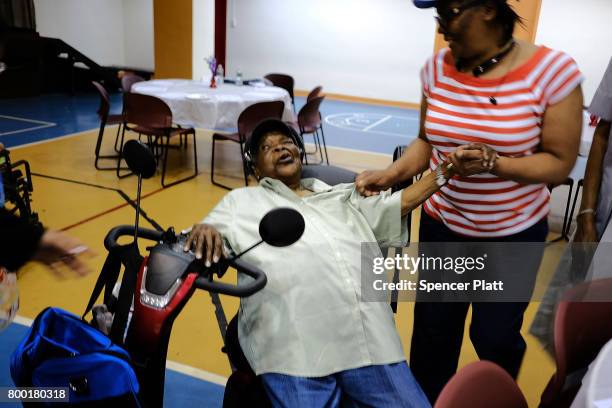 Shirley Rogers rests after dancing at a Senior Citizens Prom sponsored by the MetroPlus, a prepaid health services plan, on June 23, 2017 in New York...