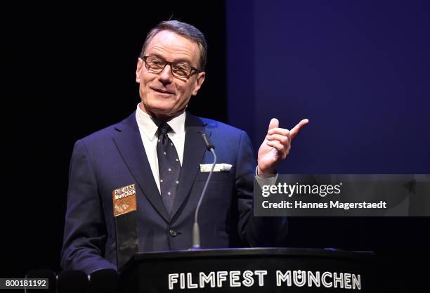 Actor Bryan Cranston talks to the audience during the Cine Merit Award Gala during the Munich Film Festival 2017 at Gasteig on June 23, 2017 in...