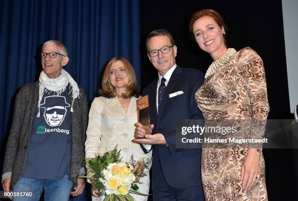 Sir Peter Jonas, Robin Swicord, Bryan Cranston and Diana Iljine attend the Cine Merit Award Gala during the Munich Film Festival 2017 at Gasteig on...